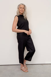Model wears Palermo Linen Pants Black with ankle detail