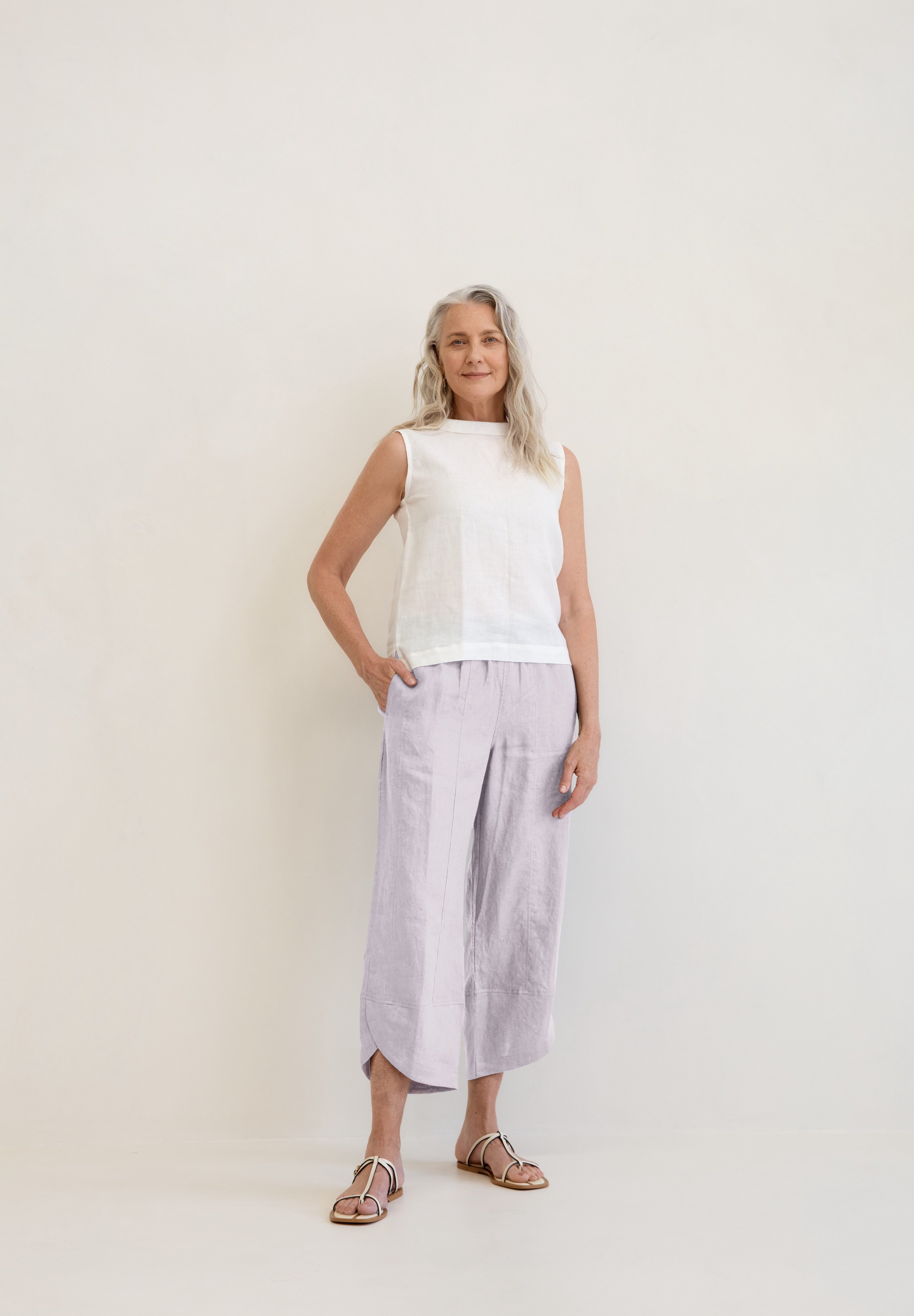 Model wears Palermo Linen Pants Silver with ankle detail