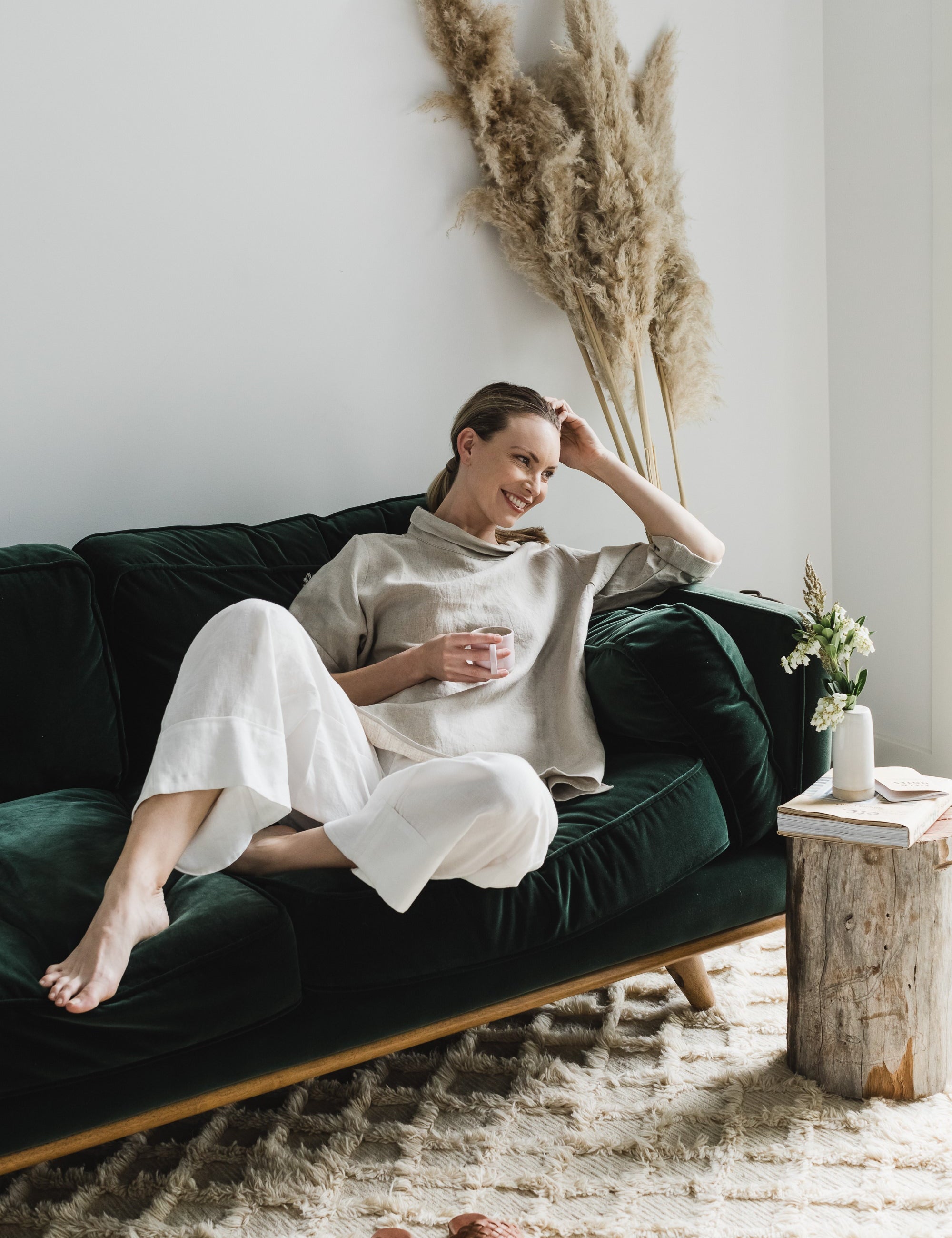 Women wearing new charcoal linen dress with sleeves and knitted cotton vest