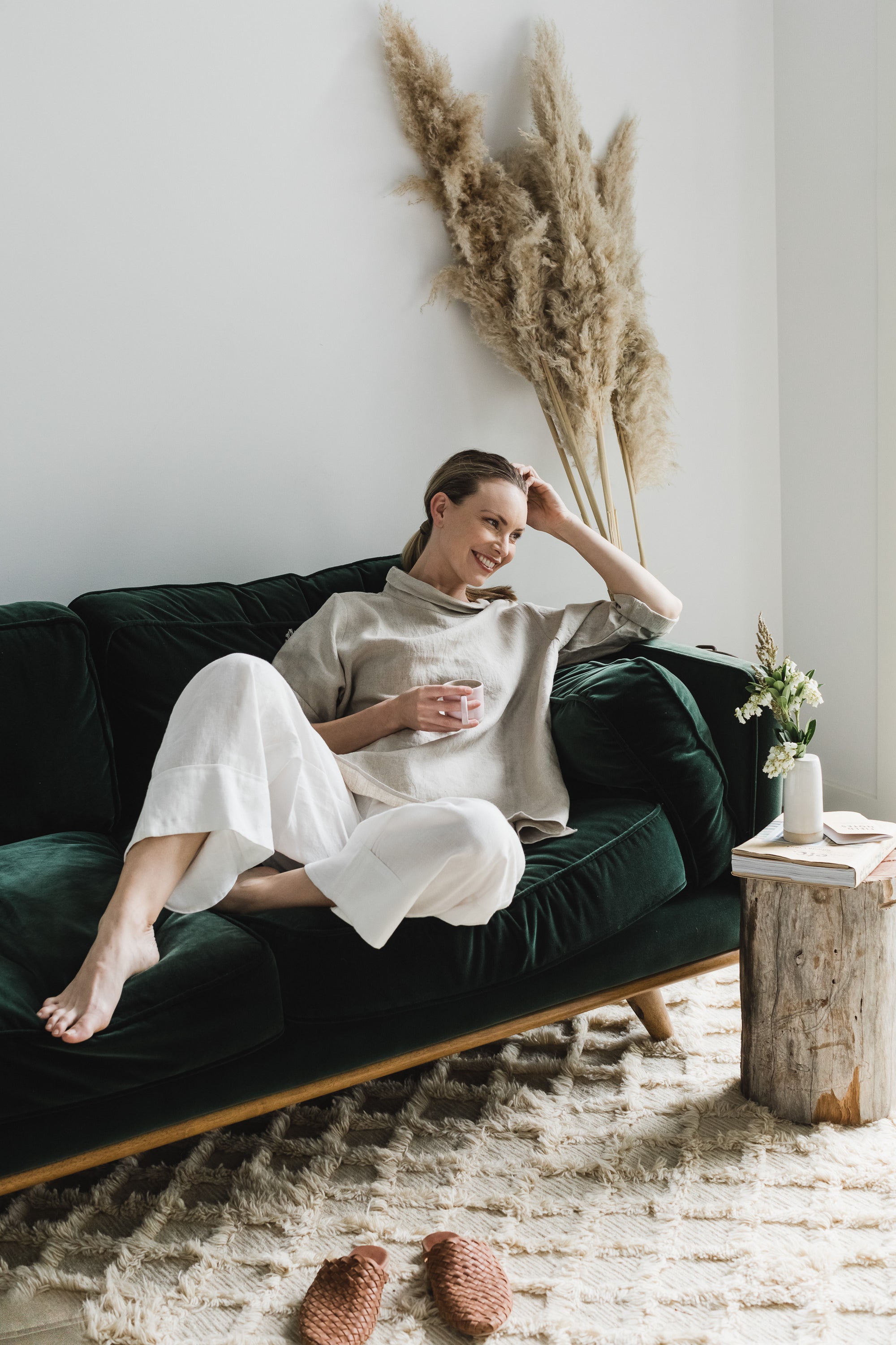 Women wearing new charcoal linen dress with sleeves and knitted cotton vest