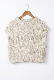 Harper Natural Textured Knit Vest on a hanger, showcasing a cozy, neutral-toned design with a chunky texture.
