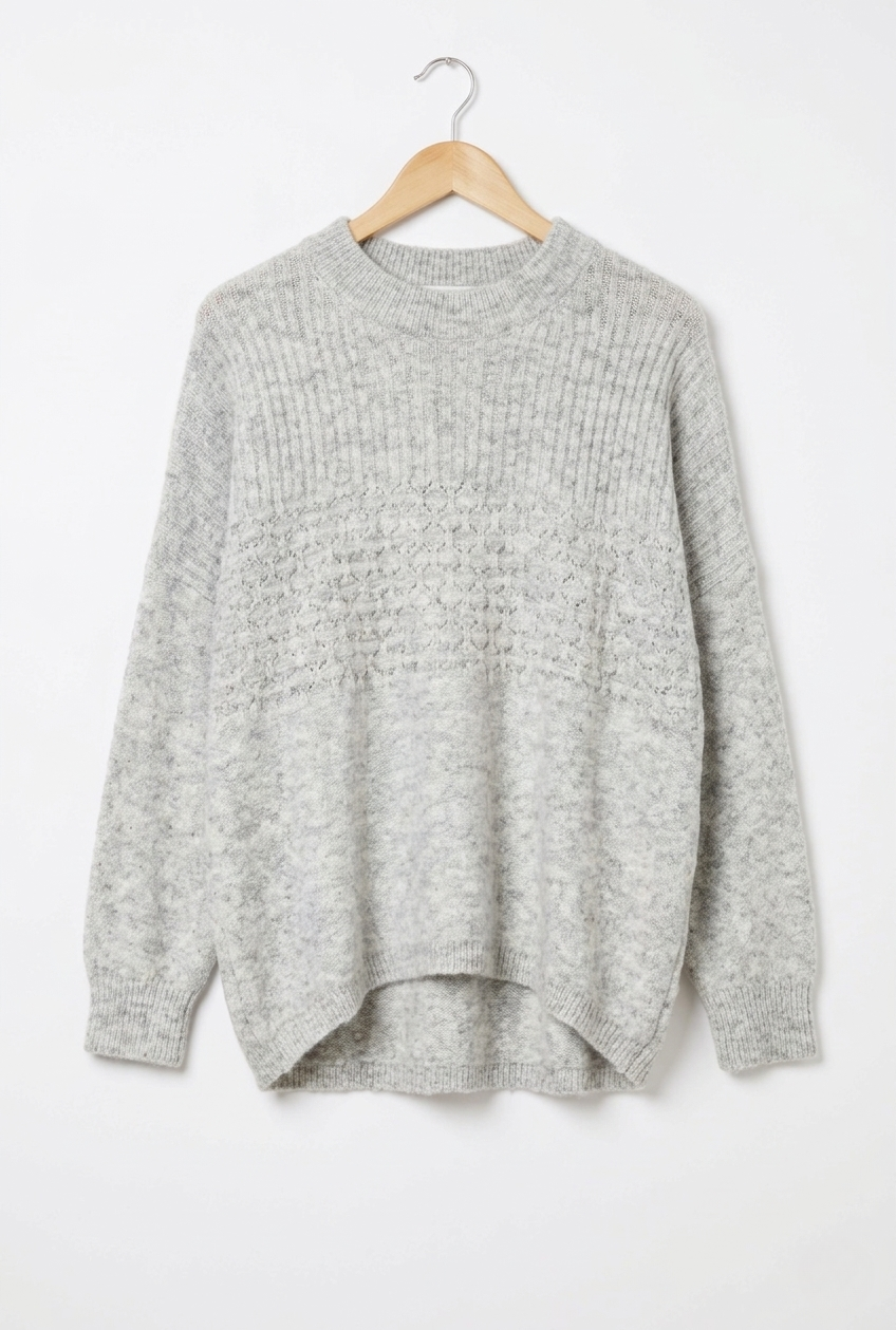 Marlo Wool Blend Jumper Dove Grey displayed on a hanger showcasing its soft knit texture and relaxed style.