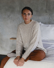 Marlo Wool Blend Jumper Soft Stone worn by a model, showcasing a cozy knit design in a soft stone color.