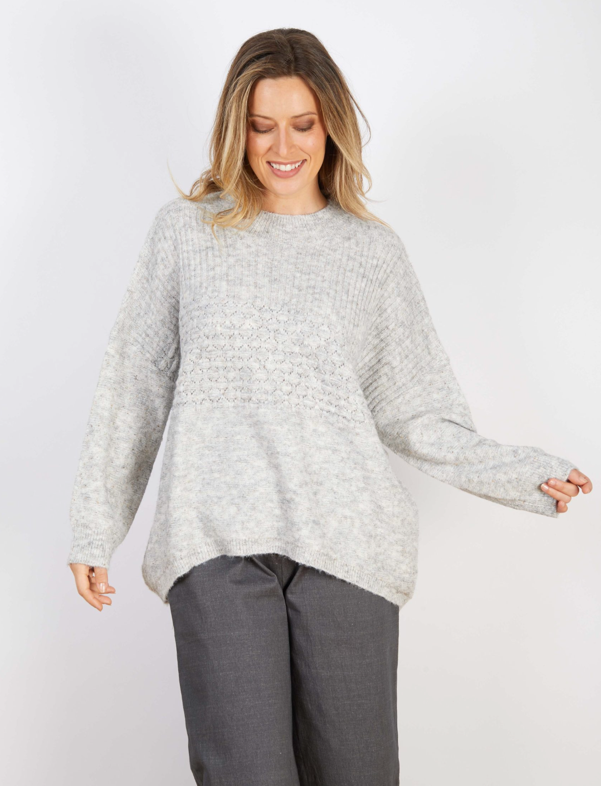 Marlo Wool Blend Jumper Dove Grey on model, showcasing its soft knit texture and relaxed style perfect for cooler months.