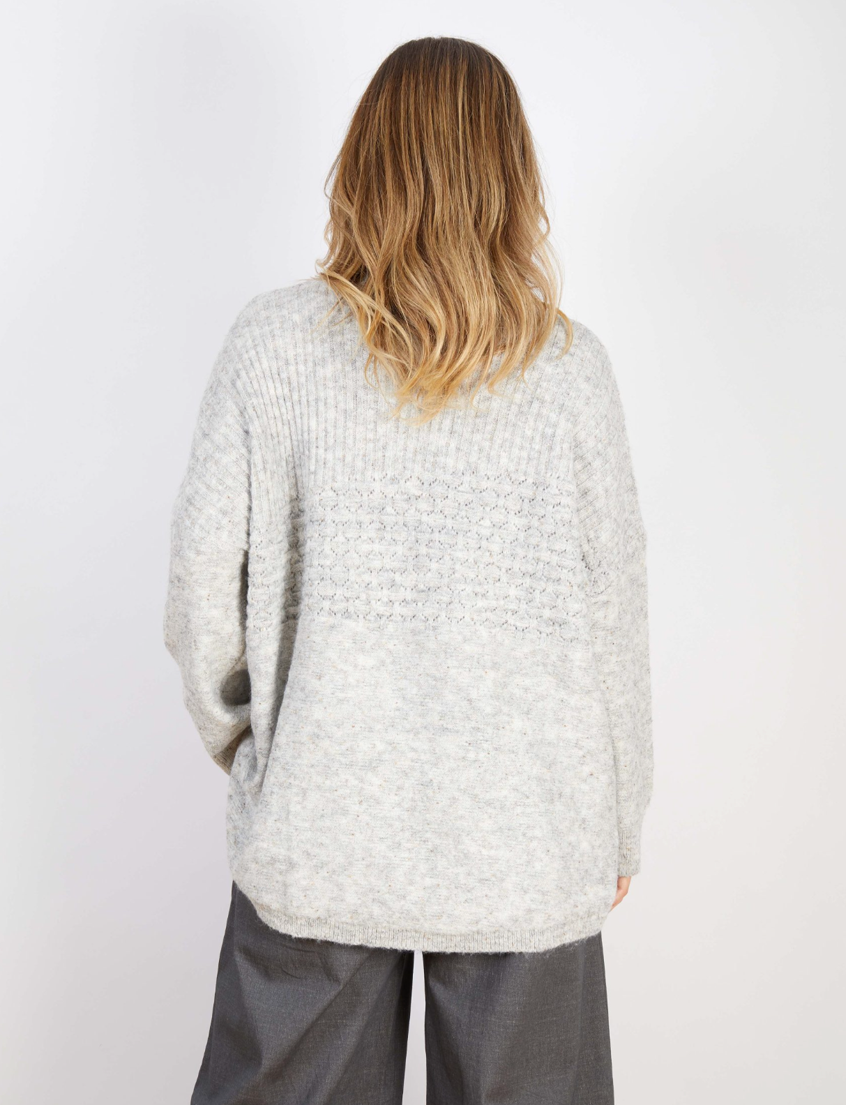 The back of the Marlo Wool Blend Jumper Dove Grey on model, showcasing its soft knit texture and relaxed style perfect for cooler months.