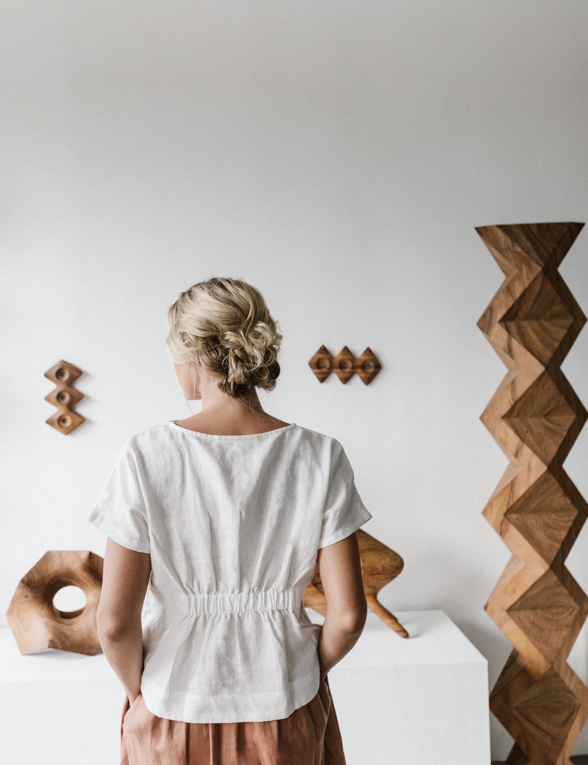 Back detail of the Zoe Linen Top Warm White a considered slightly cropped design